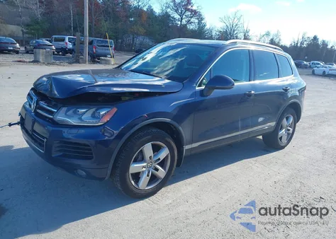 2014 Volkswagen Touareg Tdi Lux z USA, uszkodzony, nr VIN WVGEP9BP2ED014591